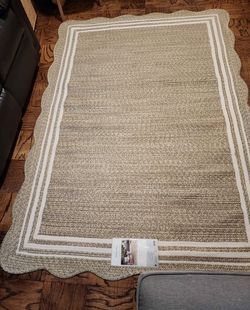 Brand new 5 x 7 Indian made braided area rug. Indoor or outdoor. 