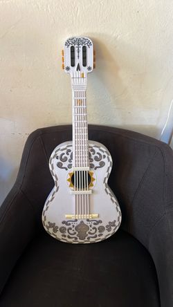 The movie coco white guitar  $5