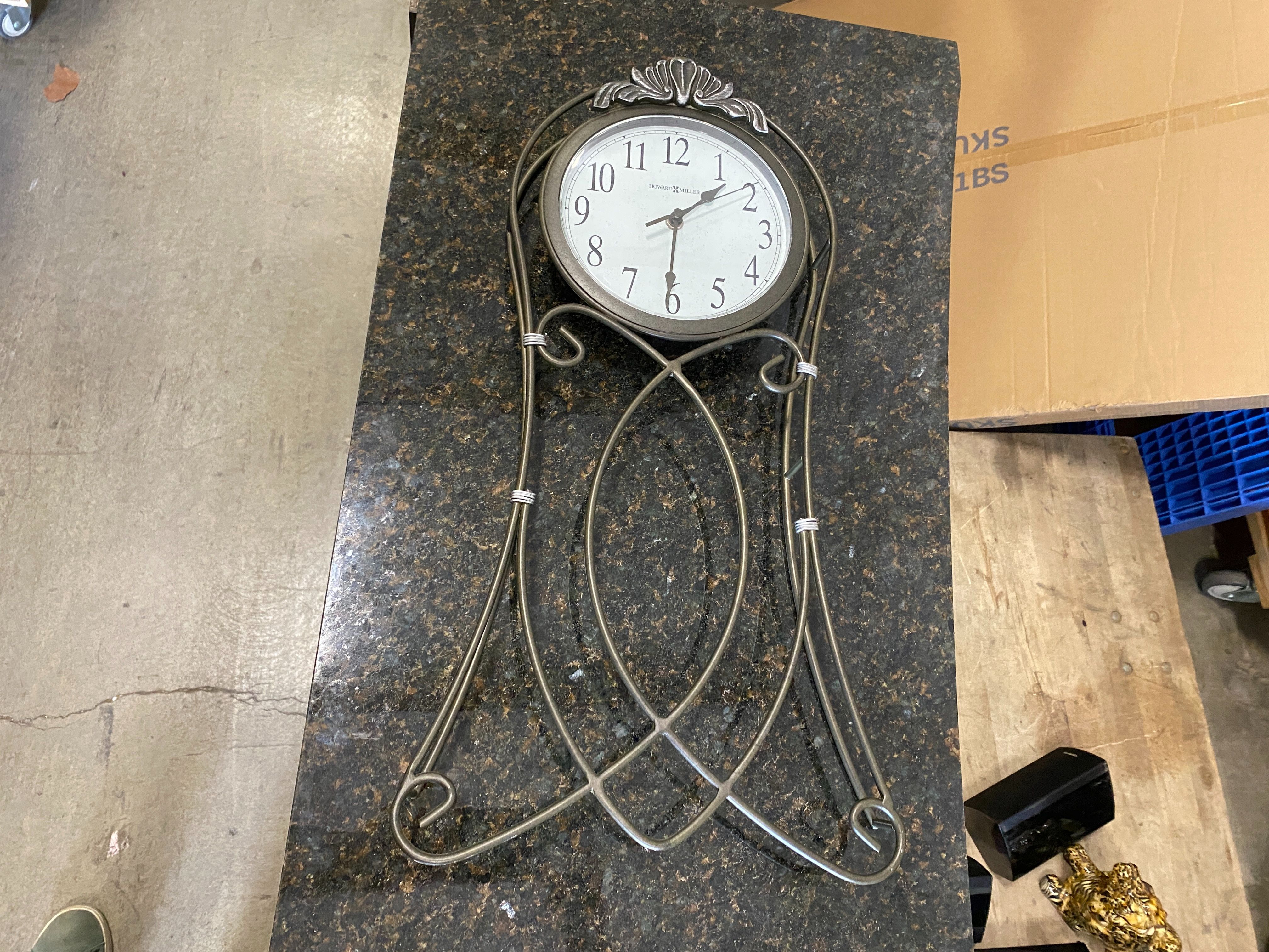 HOWARD MILLER Shannon Bent Metal Wall Clock