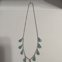 Silver necklace with turquoise carms