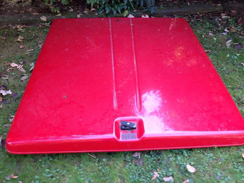 Truck bed cover. Fits 6 ft bed. Good condition, heavy and solid built.
