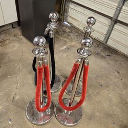 Stanchions With Red Velvet Ropes