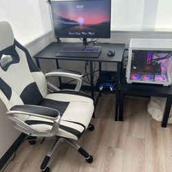 Gaming desk, table stand, and gaming chair all in very good condition