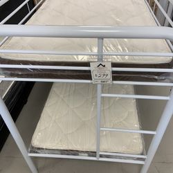 Brand New White  Metal twin bunk beds!