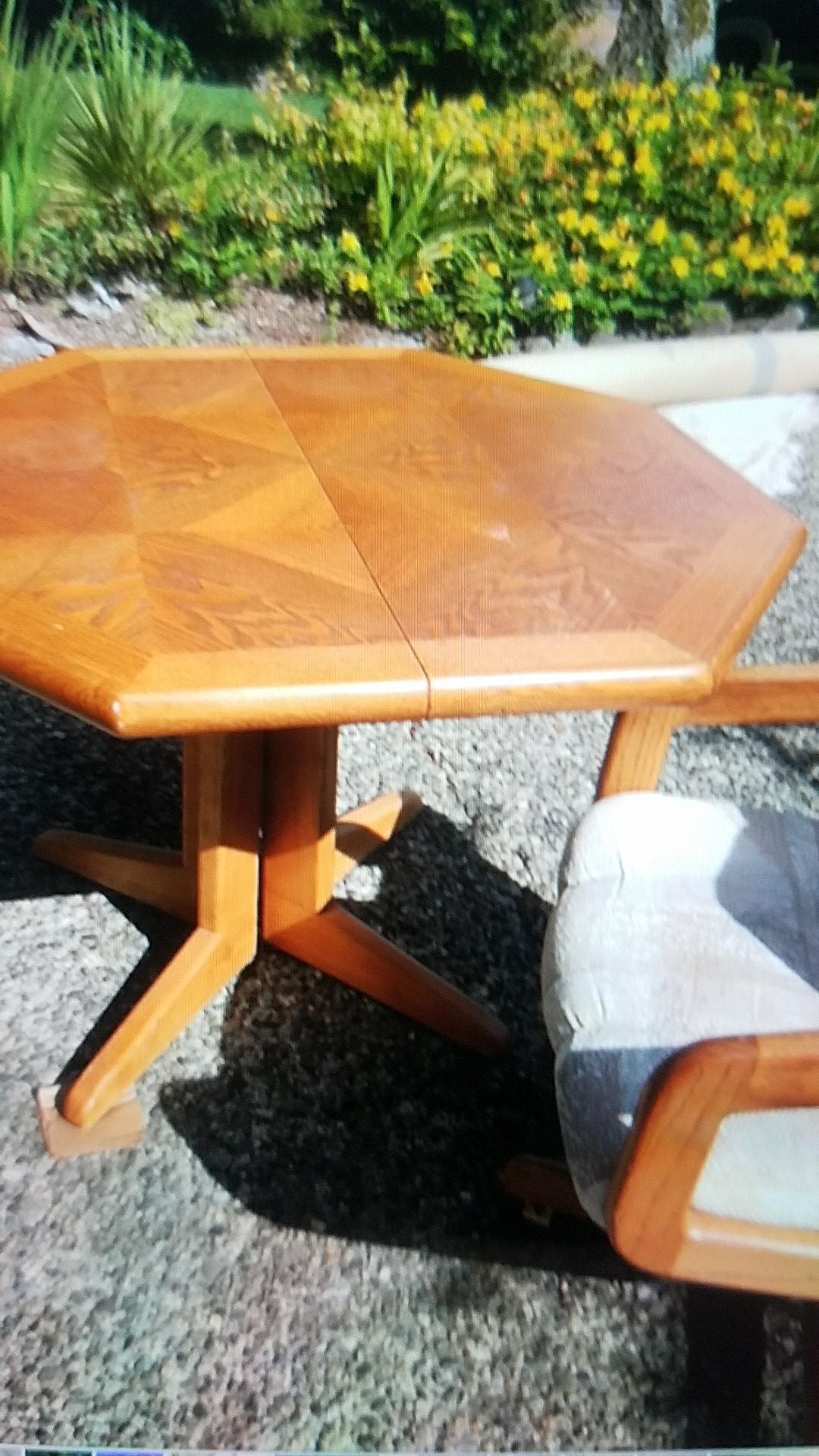 Dining table with rolling chairs