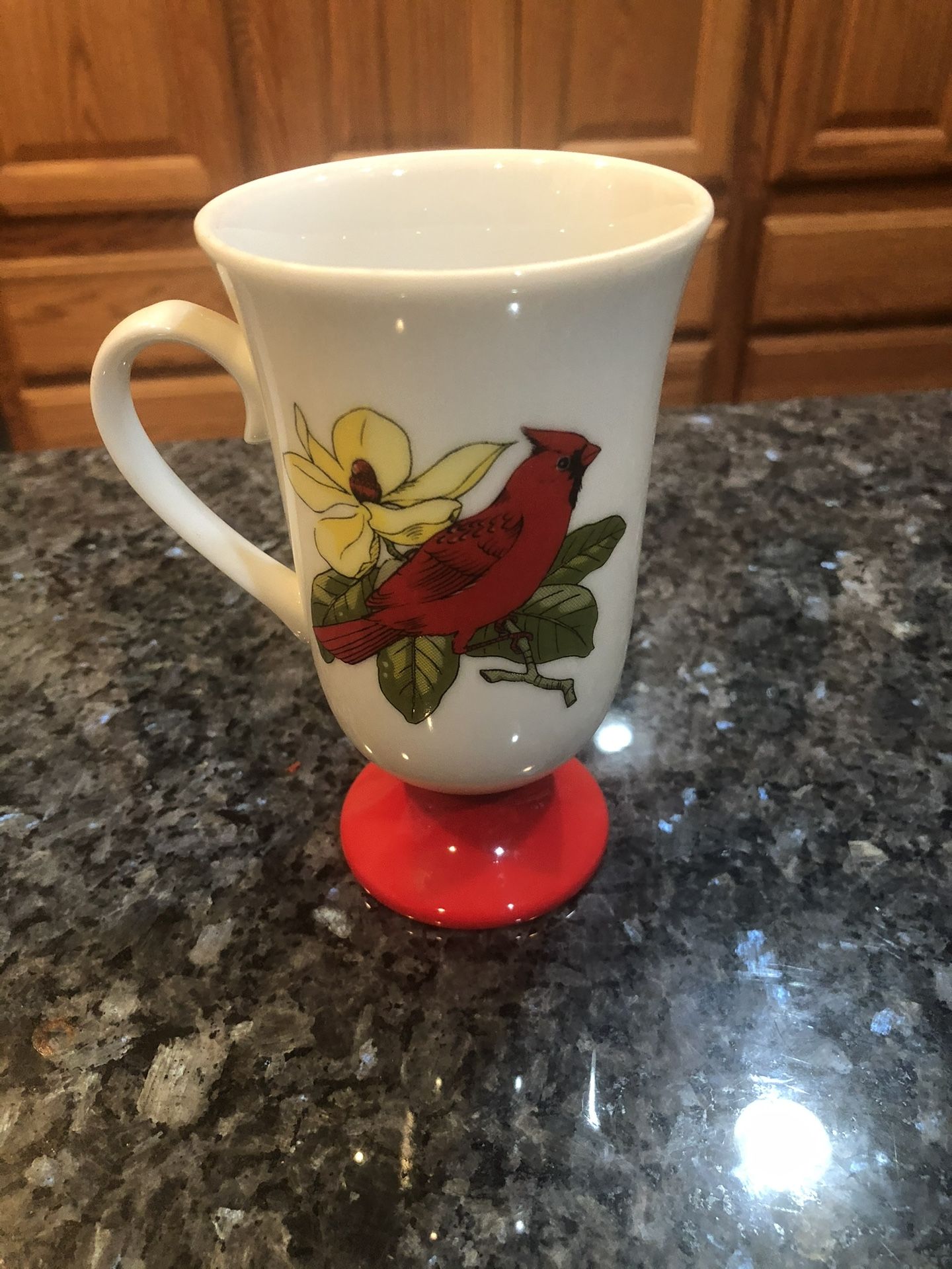 Vintage Old Bone China Coffee with a pretty red Cardinal bird design. Fred Roberts. With a pedestal base. Size 5 1/4 inches tall and 3 inches wide