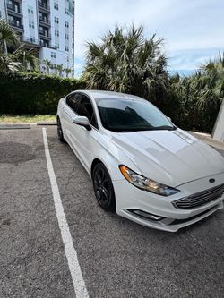 2018 Ford Fusion White Sedan with Black Wheels