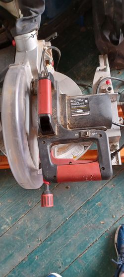 12" compound miter saw with laser trac on foldup stand