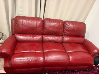 Red leather reclining sofas and loveseat set