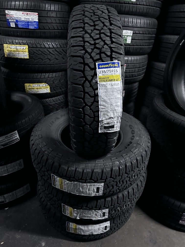 SET OF NEW TIRES 235/75/15 GOODYEAR WRANGLER TRAILRUNNER AT INCLUDING MOUNT AND BALANCE