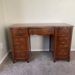 Vintage-style wooden desk with drawers