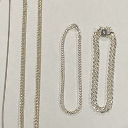 Two 925 silver chains and two 925 silver bracelets.