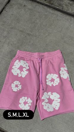 Pink denim tear shorts