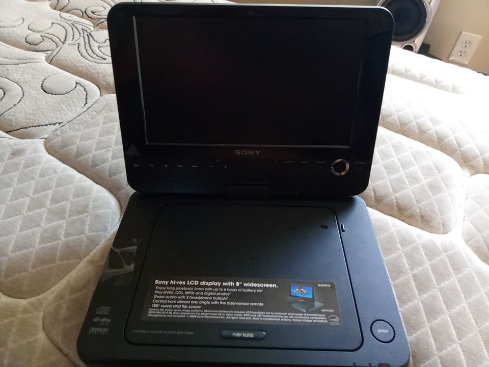 Sony Portable CD/DVD Player With It's Remote Control , Manuel, Charger & Three Movies. Tested & Working!"