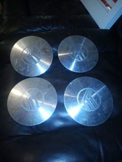 REDUCED.....Mercury Center Caps