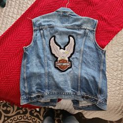 Levi Denim vest, with Harley Davidson  patches front and back. Size large, it's kind of a big large though..