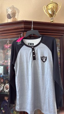 Brand new long sleeve Raider blouse