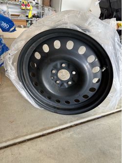 Fairly  new 17” rim and used tire