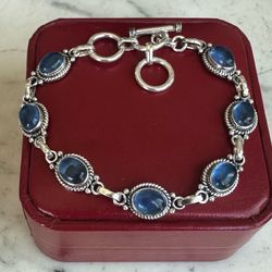 925 Sterling Silver  blue glass bracelet, marked 925 , size 7 , 7.5 and 8 , adjustable , toggle closure