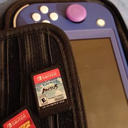 Nintendo switch with 2 games and travel case