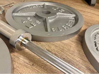 Full set of CAP Gray Olympic Weight Plates in NEW Condition & Brand NEW 6 ft Bar Steel Bar With Cooper Bearings [ Total 287 lbs].