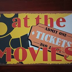 at the MOVIES ADMIT ONE TICKETS Tin Sign