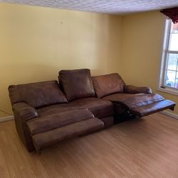  Leather Dual Power   Reclining Sofa  With One Recliner.  