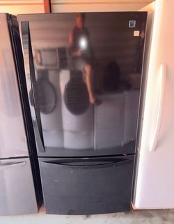 Black Kenmore Refrigerator And Freezer
