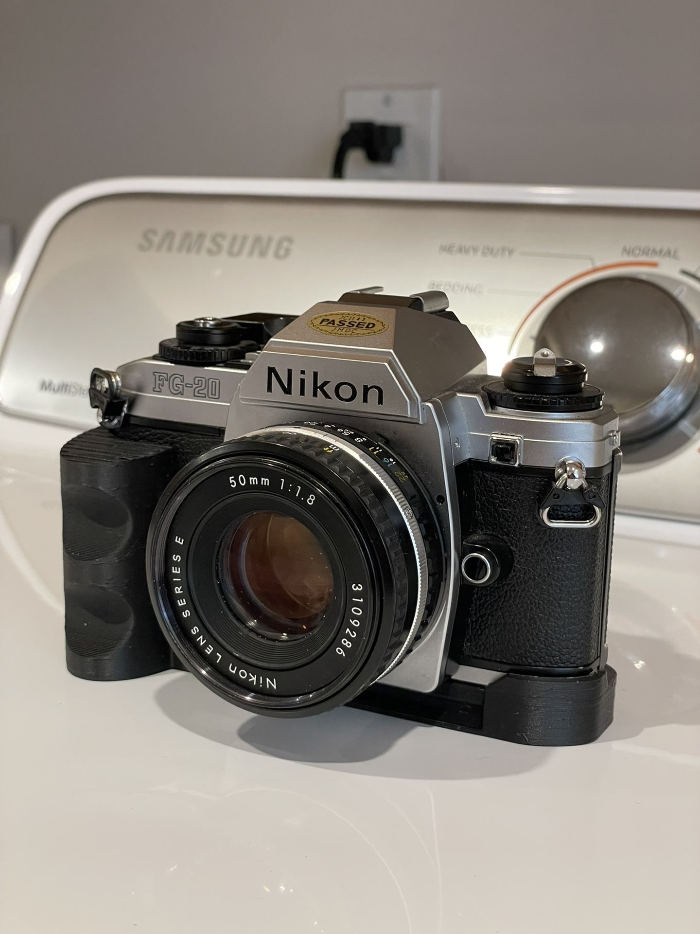 Nikon FG-20 with 50mm f1.8 pancake lens and 3D printed grip