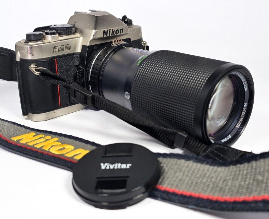 Nikon FM10 35mm SLR Camera w/ 75-200mm Lens & Nikon Strap - WORKS GREAT