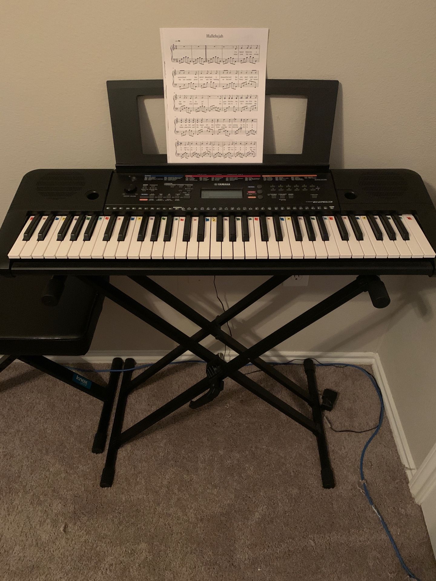 Yamaha piano with chair