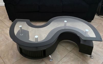 S shaped glass coffee table