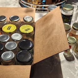 Assortment of empty glass jar containers with lids in different shapes and sizes.
***** Cash 💸 only, please. Front Door pick-up