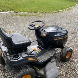 lawn mower , Pouland  PRO 300Ex . has been inside the garage all the time . Pending .