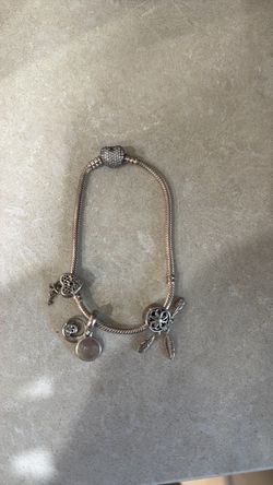 Pandora bracelet with 3 charms