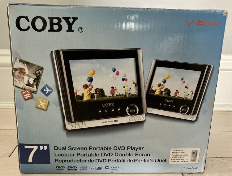 NEW OPEN BOX COBY Dual LCD Display Tablet Portable DVD/CD/MP3 for Sale in Mendon, MA - OfferUp