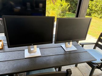 Two 24 inch HP EliteDisplay E242 Monitors