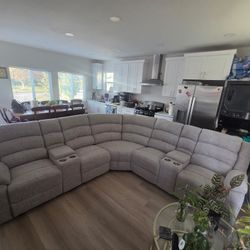 New Reclining Sectional.  Beige Fabric.  116” X 116”.  Free Delivery!