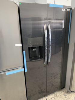 Frigidaire gallery side by side in dark stainless