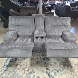Ashley Furniture double power reclining loveseat with center console