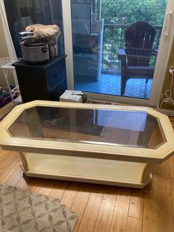 Coffee Table with wheels 19 inches tall 49 inches long 26 inches wide $60