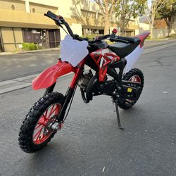 49cc Mini Dirt Bike Pit for Kids 2-Stroke off Road mix weights 135lb, top speed 20mph