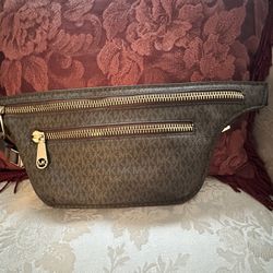 $90. MICHAEL KORS BELT AND CHEST BAG.
