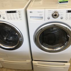 Lg Washer & Electric Dryer On Pedestals *We Finance 