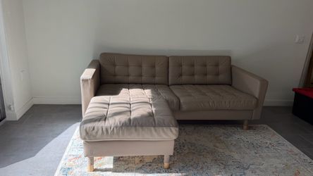 Tufted Leather Sectional Sofa with ottoman