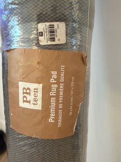 5x8 rug pad (never opened)