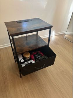 Nightstand w outlet plug in