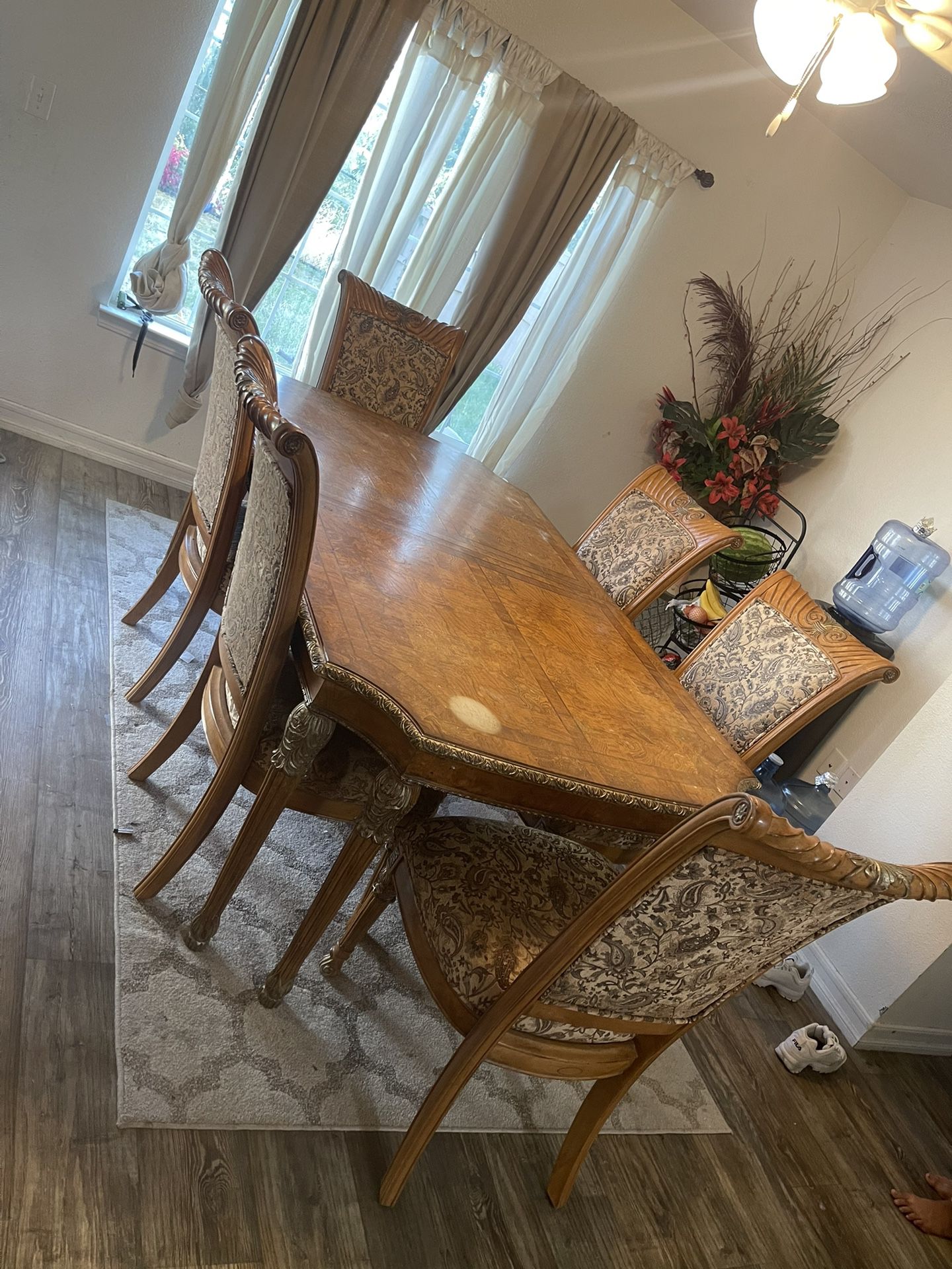 Dining Table + 6 Chairs + Floral Arrangements + Rug