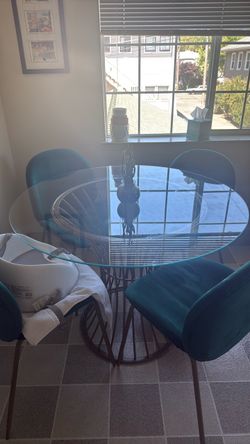 Glass Top Pedestal Table with Four Chairs