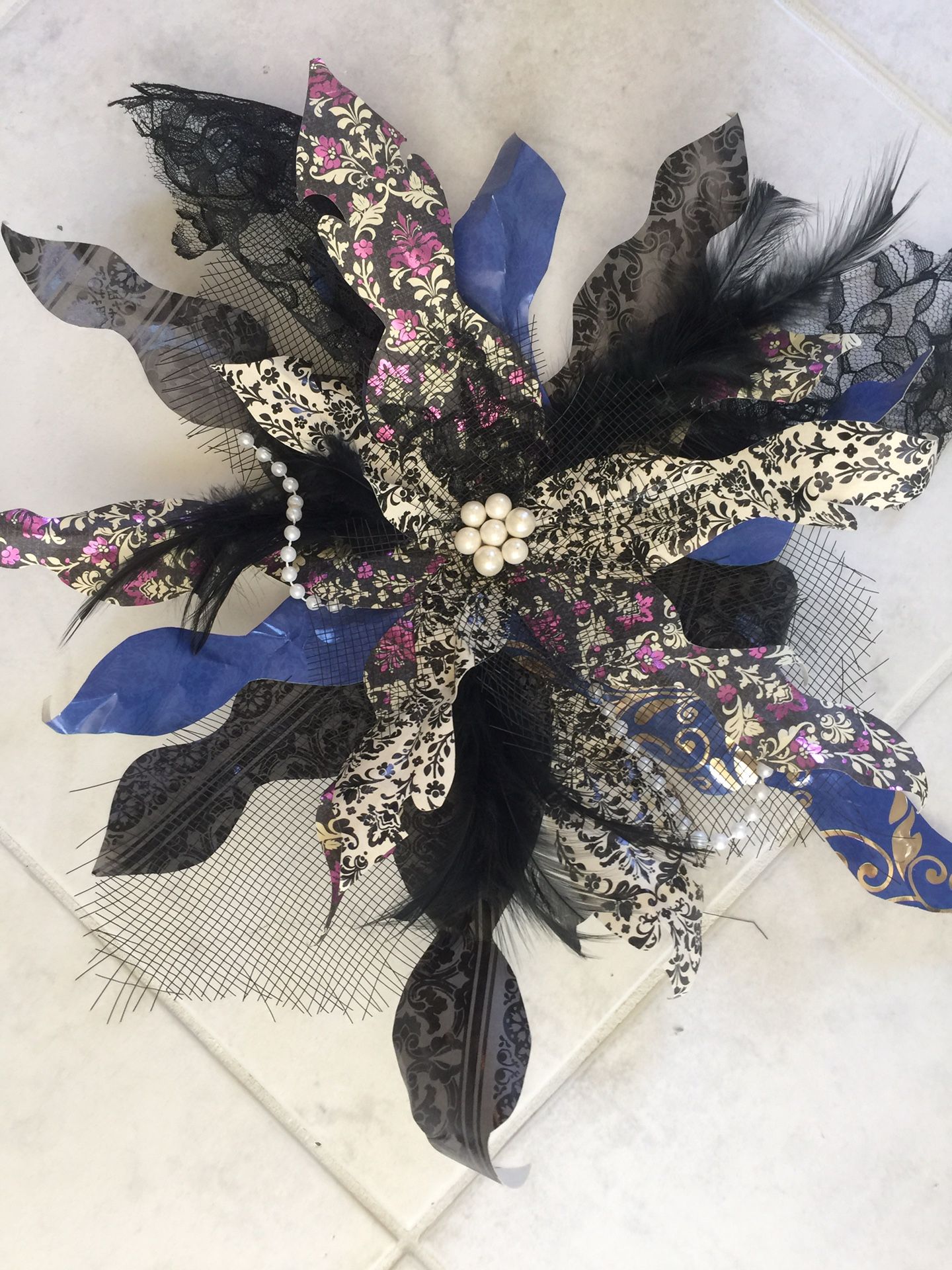 Decorations. Party. Feather. Pearl. Paper pinwheels